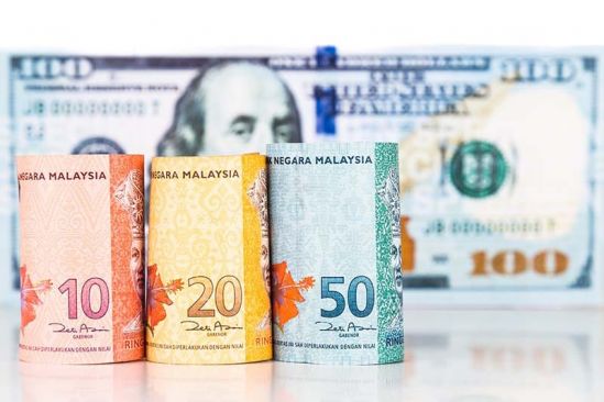 Ringgit closes lower against US dollar